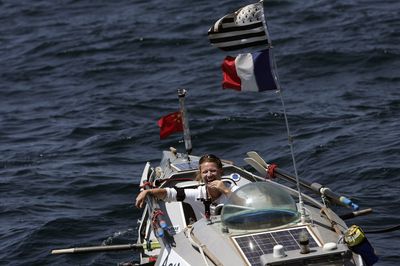 Photo de Patricia Lemoine dans son bateau