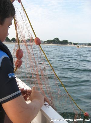 Photo de la pose de filet en baie de Concarneau.